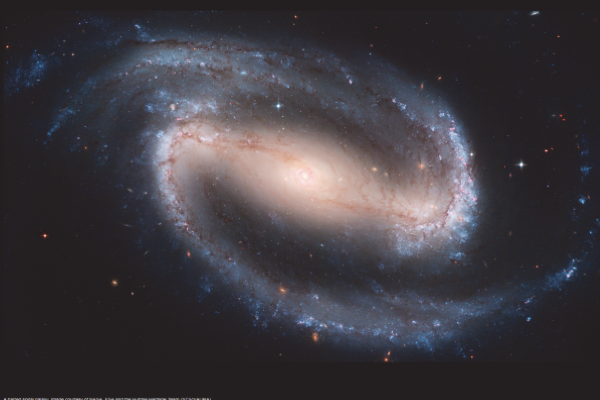 A barred spiral galaxy. Image courtesy of NASA, ESA and the Hubble Heritage Team (STScI/AURA).
